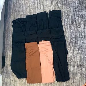 11 pairs of black leggings and 2 brown pairs of leggings!